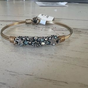 Luca and Danni ANGEL MEDLEY BANGLE: a winged figure with hands folded in prayer